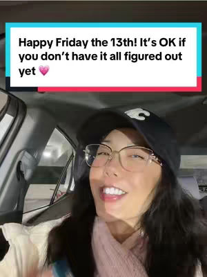 The cover image is a selfie taken from inside a vehicle. The creator, a woman with glasses and a black hat, is smiling at the camera. A rectangular text overlay is at the top, against a blue/red background.