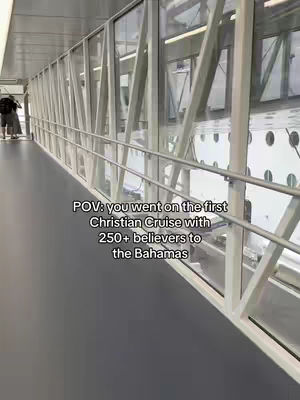 The cover image shows a contemporary interior shot of a bright, lengthy corridor or walkway, constructed with glass and metal components. The perspective is elongated, showcasing the architectural design and the flow of space. A person with a backpack is visible walking down the corridor, suggesting a journey or passage through the building. White text overlayed on the image reads, "POV: you went on the first Christian Cruise with 250+ believers to the Bahamas."