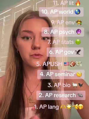 A young woman with blonde hair is centered in the frame, looking at the camera. Behind her is a white, paneled wall and window blinds. Overlayed on the image are a series of text boxes listing various AP (Advanced Placement) subjects.