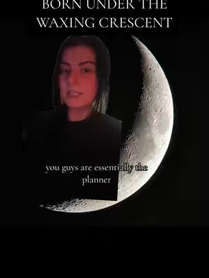 The image shows a person in front of a crescent moon. Text overlays at the top read "BORN UNDER THE WAXING CRESCENT". Additional text at the bottom says, "you guys are essentially the planner". The person has light skin and dark hair, and is wearing a black shirt. The background is a deep black, enhanced by the crescent moon. The moon is bright and white with details.