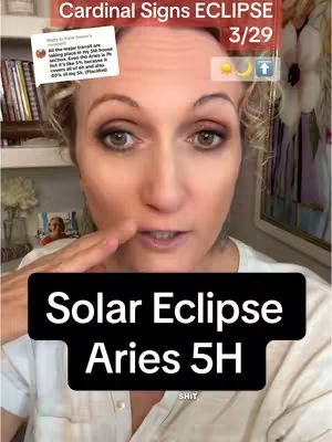 A woman with fair skin, light brown hair, and dark eye makeup is the central focus. She's looking towards the camera, with her right index finger touching her lips, and there are text overlays at the top and bottom of the frame. The top text reads "Cardinal Signs ECLIPSE 3/29" in a red banner, accompanied by a moon and upward arrow icon. Below, a black bar reads "Solar Eclipse Aries 5H". The background shows glimpses of a room, with books and a floral arrangement visible.