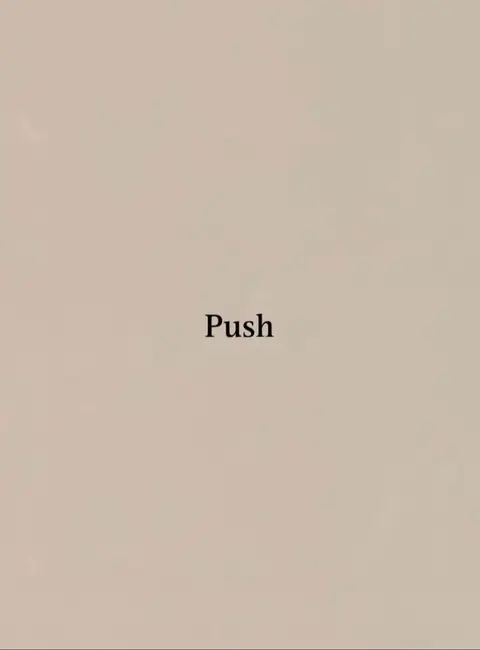 The cover image is a simple, minimalist design. It features a plain, beige background with the word "Push" in a slightly darker shade placed centrally. The layout is uncluttered, drawing attention to the single word. The lighting is even, without any shadows or gradients, keeping the focus on the text.