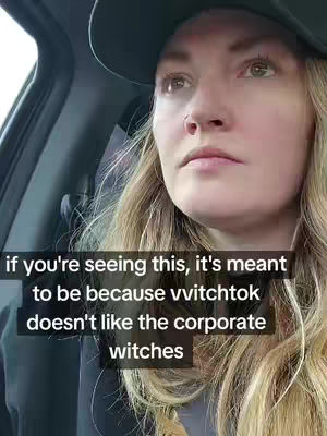 A woman wearing a hat, driving in a car, with text overlays. She looks upwards, with natural skin and blonde hair. The car interior is visible.