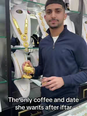 A man stands in a jewelry store, holding a gold coffee pot and glass, with gold jewelry displays in the background. Text overlay appears on the cover image.