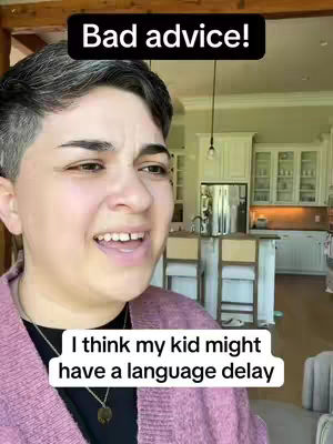 A mid-shot features a person with short, dark hair and a pink sweater; they are in a bright kitchen setting and speaking. Text overlays appear, offering insight into the video's topic, along with the headline's hook.
