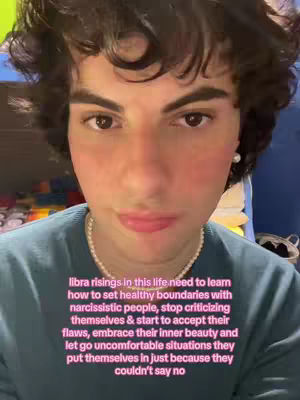 A close-up shot features a person with dark curly hair, subtle makeup, and a pearl earring. The person is wearing a teal top and a pearl necklace. Overlayed on the image is text in a pink font, offering advice about setting boundaries.