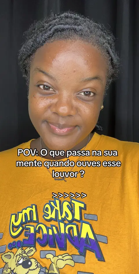 A woman with dark hair and skin, wearing a yellow t-shirt, smiles at the camera. Overlayed on the image are white text and arrows in front of the woman. Behind the woman, the background is dark.