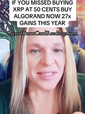 A woman with blonde hair in a green top is centered in the frame, with a text overlay at the top in a white box with black text, and the bottom text is also in white. She's looking at the camera and speaking.