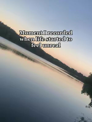 The cover image shows a calm lake scene with a gradient sky during sunset. The water reflects the sky, creating a symmetrical composition. Text overlay adds a personal note.