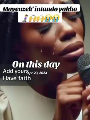 A close-up shot of a woman with dark skin, crying. She's holding a microphone, suggesting she's in the midst of a vocal performance or recording. The image is overlaid with text, and emojis in the upper area.