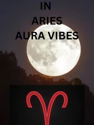 The image features a large, bright full moon centered in the background against a dark, subtly mountainous silhouette. Overlaid on the image are the words 'IN ARIES AURA VIBES' in black text. In the foreground, beneath the moon, is the Aries zodiac symbol in red against a black background.