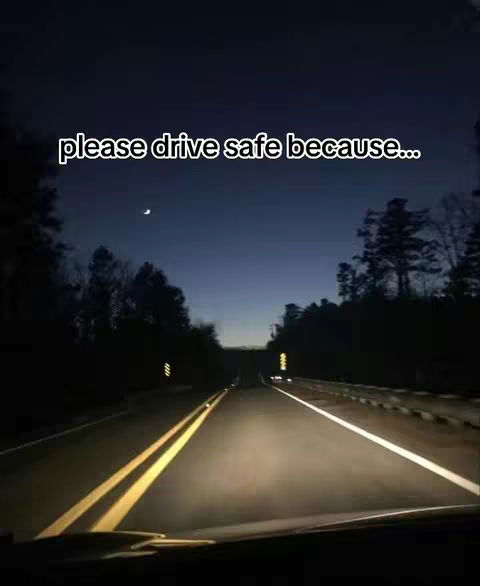 The cover image shows a point-of-view shot from inside a car driving down a dark road at night. The headlights illuminate the road ahead. There's a crescent moon in the sky.