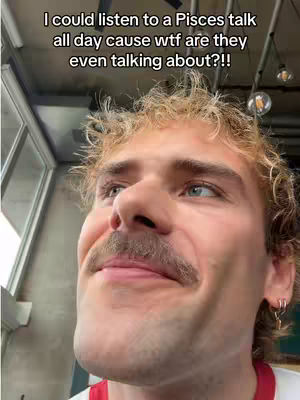 A man with light hair and a mustache is looking upwards with a quizzical expression. Text overlays the image.