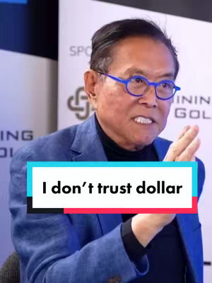 The cover image features a man in a blue blazer, black turtleneck, and blue-framed glasses. He is gesturing with his right hand, and a text overlay stating, 'I don’t trust dollar,' is present. The background is blurred.