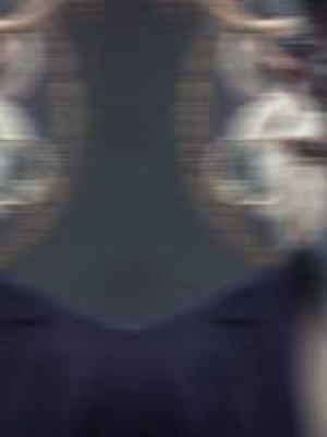 The image has a mirrored effect, featuring blurred faces on either side of a dark gray background, with a dark blue shape at the bottom.