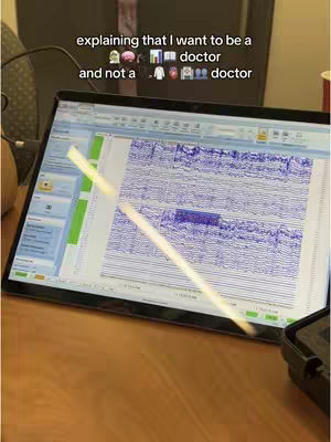 A laptop screen displaying a detailed graph, possibly related to an EEG or similar medical analysis. The screen is tilted slightly, and the background includes a wooden desk and a small black device. The text overlay explains the creator's professional aspirations.