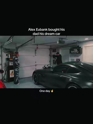 The cover image shows a man in a garage next to a black sports car (Mercedes) and text overlay.