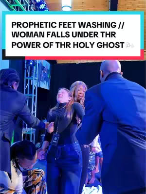 The video cover shows a blurred image of a religious setting, the foreground involves a woman being supported by other people, presumably during a religious ceremony. Several people are in view, and text with a blue background is overlaid at the top that reads, 'PROPHETIC FEET WASHING // WOMAN FALLS UNDER THR POWER OF THR HOLY GHOST'.