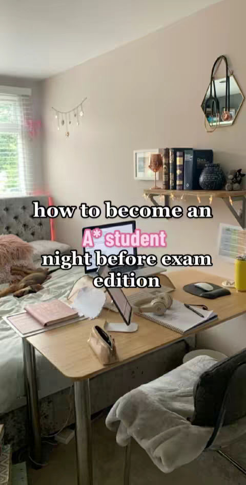The image shows a well-lit bedroom with a desk covered in study materials. On the bed is a laptop, books, and other study items. The words 'how to become an A* student night before exam edition' are overlaid at the front of the frame.