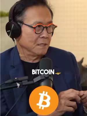 A medium shot of a man wearing glasses and headphones, speaking into a microphone. The hook text 'BITCOIN' is overlaid on the center.