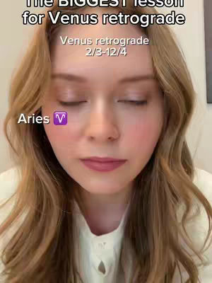 A close-up shot of a woman with long, wavy auburn hair. She has closed her eyes. Overlayed text includes the title and an Aries symbol.