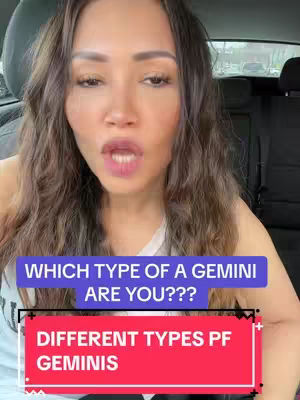A woman is seated in a car, looking at the camera with an open mouth expression. Overlay text in a purple rectangular box reads, "WHICH TYPE OF A GEMINI ARE YOU???," with a red rectangular box underneath reading, "DIFFERENT TYPES PF GEMINIS."
