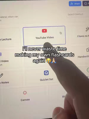 A person is holding a tablet, and a hand is pointing at the “YouTube Video” button to use the flashcards on the interface. Text overlayed says, “I’ll never waste time making my own flashcards again” with an emoji.
