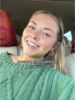 The cover image is a selfie of a smiling woman. She appears to be inside a vehicle. She has blonde hair, and is wearing a green sweater and gold hoop earrings and a necklace. Overlay text is in the image.
