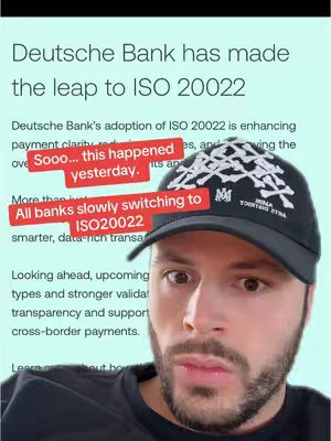 The cover image shows a man with a surprised expression looking at the camera. Overlayed on the background is a screenshot of an article on the topic of Deutsche Bank transitioning to ISO 20022, with overlayed text highlighting key points, such as the phrase "All banks slowly switching to ISO20022," written in red over the text from the article. The man is wearing a black cap with white text on it.