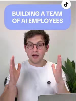 A man wearing glasses and a white t-shirt is shown with his arms raised, set against a light background and a plant.