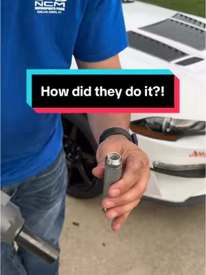The cover image shows a person holding a tool component. The person is wearing a blue shirt and jeans. A car is visible in the background.