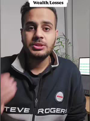 The cover image features a man in the foreground, shot from the chest up. He is wearing a black jacket with a gray collar. The background includes a plain wall, a glimpse of a desk area with some green plants, and a part of a computer screen. The text overlay displays "Wealth/Losses" in a box at the image's top.