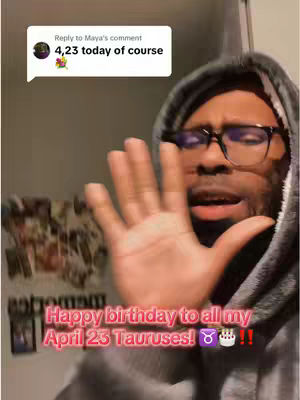 A man wearing glasses and a gray hoodie holds his hand out toward the viewer, with overlaid text at the bottom and a comment bubble in the top left corner. The background is blurred, with what looks like an image on the wall.