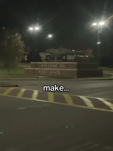 An exterior night shot with a sign that reads 'WELCOME TO FORT KNOX.' The sign is brown and orange, with streetlights illuminating the scene. The text overlay 'make...' appears at the bottom.
