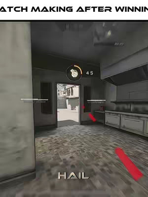 A first-person view from a video game, showing the interior of a room with a doorway leading outside. The focus is on the game interface elements, with red markers and text indicating action and status. The color palette is muted with neutral tones.