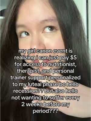 A selfie-style video cover image features a woman with long black hair looking up and to the side. Overlaid on the image is a block of white text, and her hands are partially visible. The overall composition is centered, with close framing.
