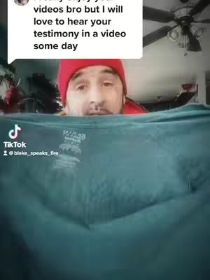 The cover image shows a man wearing a red beanie. He is looking at the camera from behind a teal-colored cloth. A comment bubble with white background is at the top with text. A Tik Tok logo is at the lower left.
