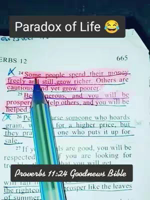 The image is of an open book with handwritten notes and highlighted text. A pen is in the foreground, pointing to a passage. A quote in a black box at the bottom reads, "Proverbs 11:24 Goodnews Bible."