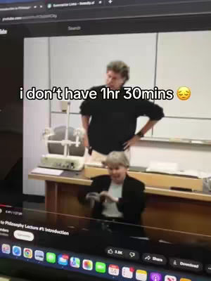 The cover image is a screenshot of a YouTube video. The main subject is a scene from a television program, capturing a lecture setting. Two middle-aged people are present in the scene. The foreground includes the lower part of a screen with several icons and navigation features. The text overlay reads 'i don’t have 1hr 30mins' adding context related to the video. The color palette is dominated by cool colors.