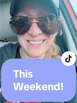 The cover image captures a woman's face, appearing to be in a vehicle. She is wearing large sunglasses that reflect the surroundings, a hat, and has blonde hair. A text overlay in a light purple rectangle states 'This Weekend!' with a simple black font, located at the bottom of the image; a TikTok logo is visible at the bottom right corner.