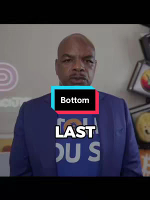 The cover image features a middle-aged Black man in a blue suit, looking directly at the camera. The image is framed from the chest up, with a text overlay. Behind the man, a neutral wall provides a clean backdrop. The man has short, well-groomed hair and a neutral facial expression. Overlay text includes "Bottom" and "Last" in front of a logo.