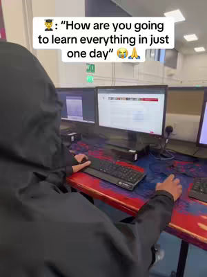 The cover image shows a person from the back seated at a desk with multiple computer monitors. The person is wearing a hooded jacket and typing on a keyboard. A text overlay floats at the top of the frame.