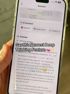 The cover image shows a person holding a smartphone displaying a digital image of a math problem on the screen. The phone is encased in a clear case. Overlaid on the screen is text in a stylized font with a pink brain icon. The background is a light-colored surface with some details, potentially illustrating an app UI.