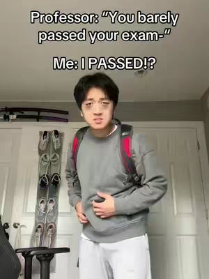 A young man wearing a grey sweatshirt and white pants stands in front of a white door. Text overlays the image. The man appears concerned.