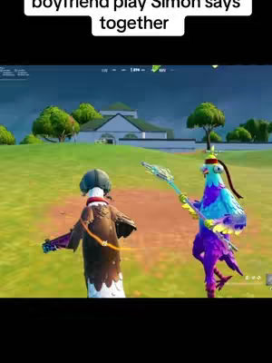 The cover image shows a scene from the video game Fortnite. Two player avatars are positioned on a grassy field, in front of a building and some trees. One avatar is dressed as a bird, holding a pickaxe, while the other is dressed in a coat and a helmet. Above the image, the text 'boyfriend play Simon says together' is displayed.