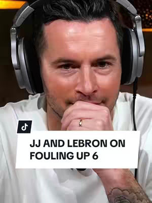 The cover image features a close-up of a man wearing headphones. He has short, dark hair and is looking down, with his fingers touching his lips. A white text box appears in the center of the image with the text 'JJ AND LEBRON ON FOULING UP 6'. The background is blurred and appears to be in a studio setting.