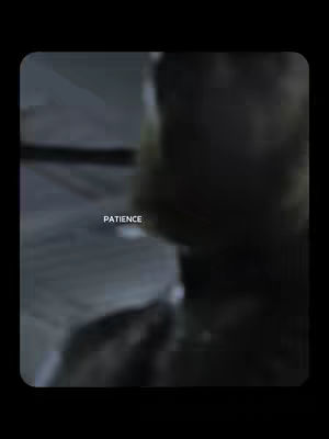 The cover image is a blurred, dark, and moody shot. A figure, likely a person, is visible in the right half, with the upper body partially in view. The color palette is muted, with a combination of grayscale tones. The word "PATIENCE" is in white text in the bottom-center of the image.