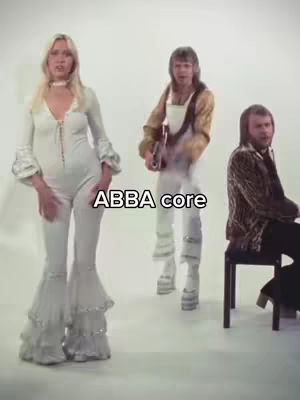 The cover image features a vintage photograph of the band ABBA, with the text overlay "ABBA core." The image is composed of three people who appear to be members of the band, with the background being plain. The text is white and overlaid in the middle of the image