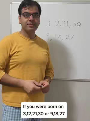 A man wearing glasses and a yellow shirt stands in front of a whiteboard with numbers written on it. Below him, a text overlay states, "If you were born on 3,12,21,30 or 9,18,27".