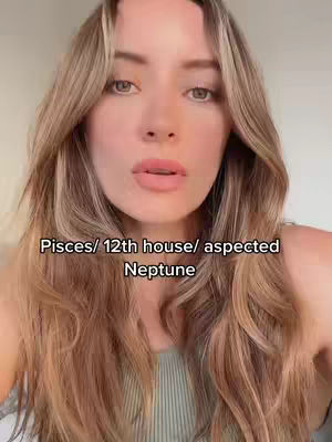 A close-up shot of a woman with long, wavy blonde hair looking directly at the camera. Text overlay sits below her face.